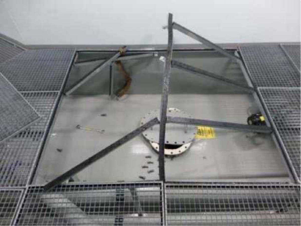 IMCA SF: Lost time injury (LTI): Crewman injured during opening of tanks Image3 (3) damaged grating and manhole from starboard side