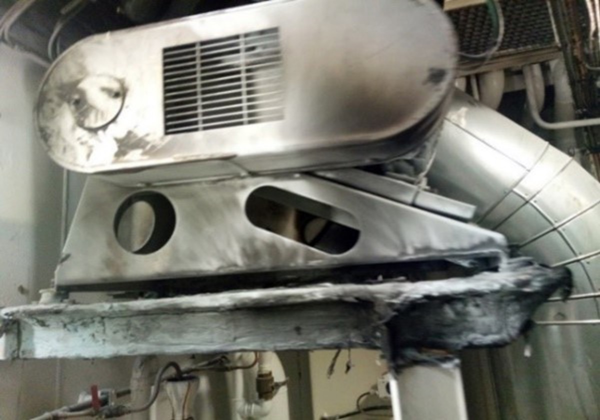 The exhaust fan holding bolts were found broken inside the casing