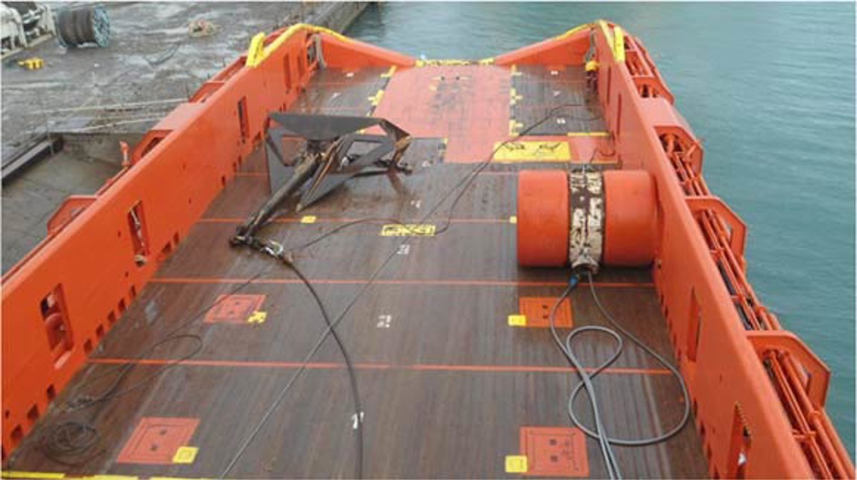 IMCA SF: Capstan wire parted during deployment of anchor buoy Imcasf03 15 Image1 View of back deck showing Delta Flipper anchor (left), Anchor Buoy (right) and Capstan (arrow)