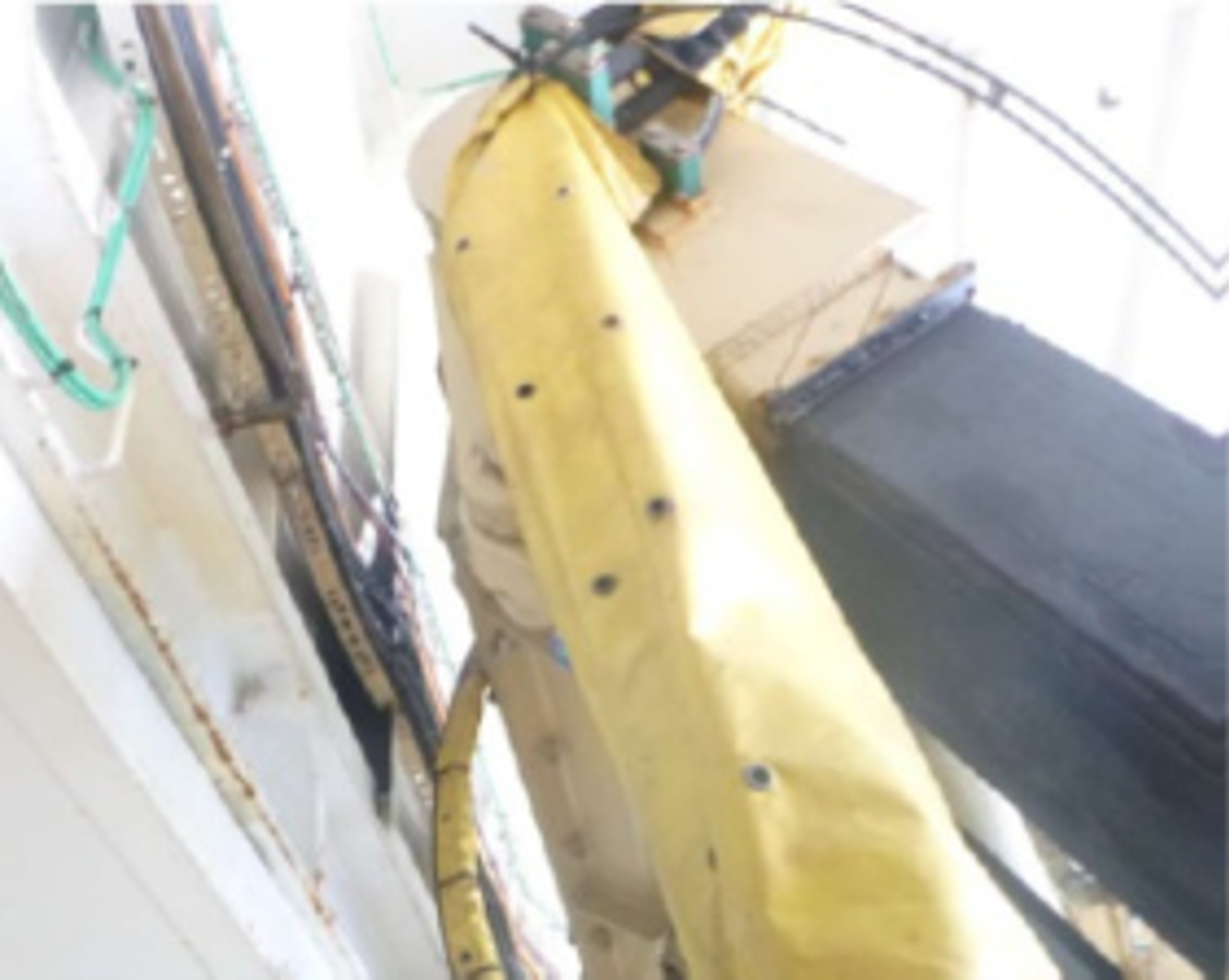 IMCA SF 27/19: Cabling In ROV Hangar 2 Cables and hoses in the ROV hanger had been inadvertently severed by the ROV launch and recovery (LARS) frame which had come into contact with the bulkhead cable tray (yellow structure in second photo).