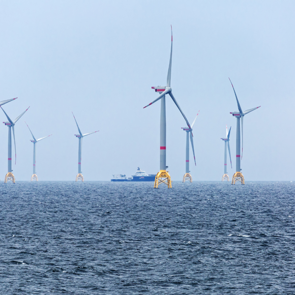 Photo of vessel near an offshore wind farm