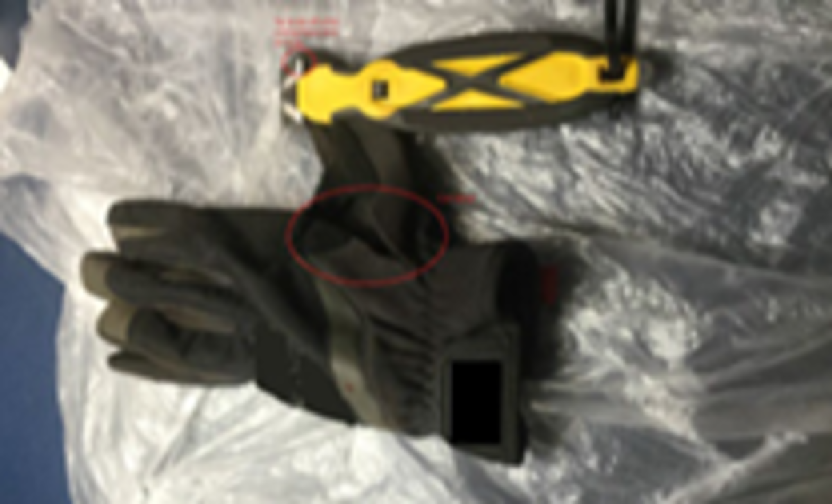 Damaged alternative cutting device and cut glove