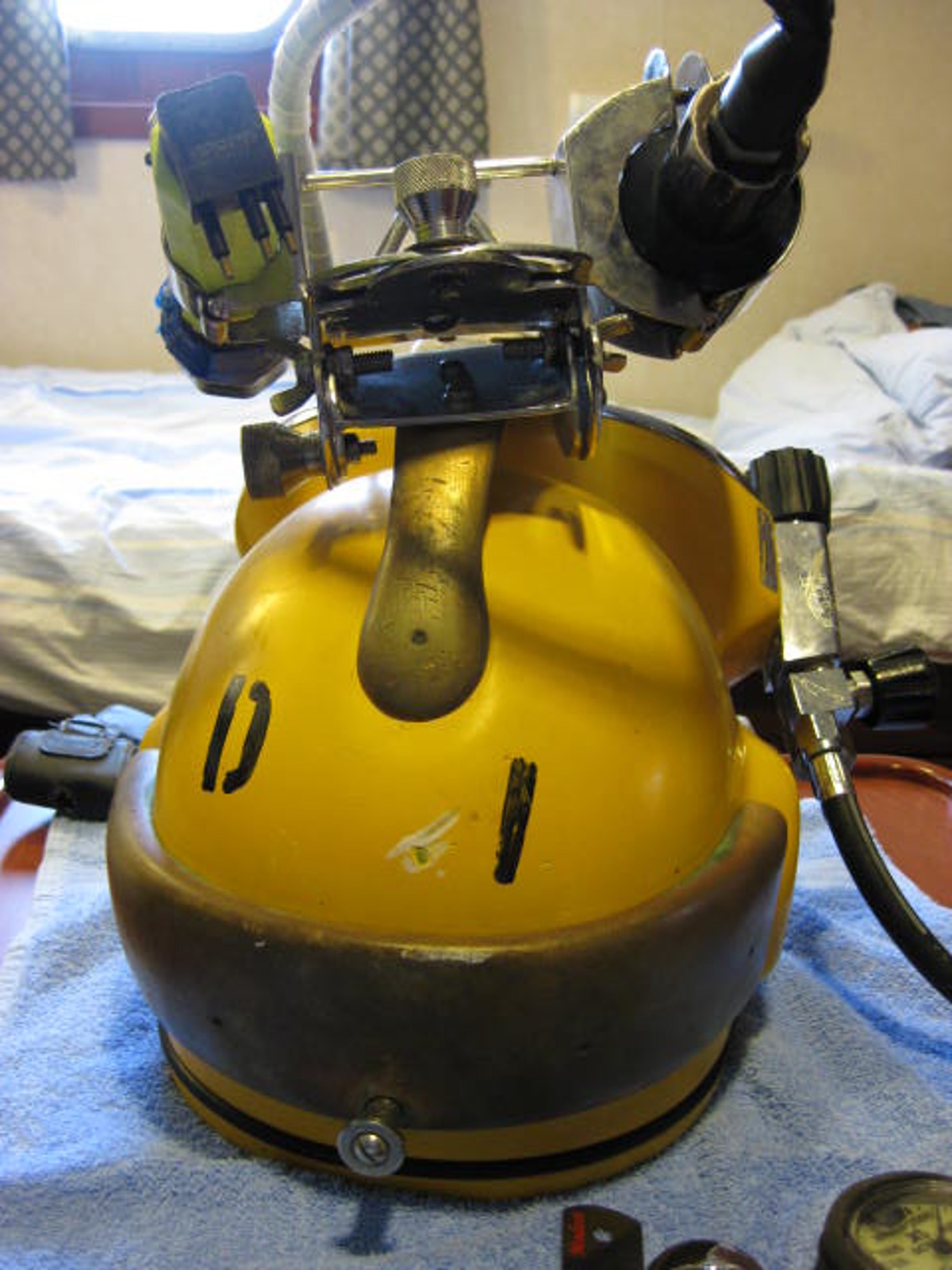 Diver’s hat with the indentation where valve hit the hat