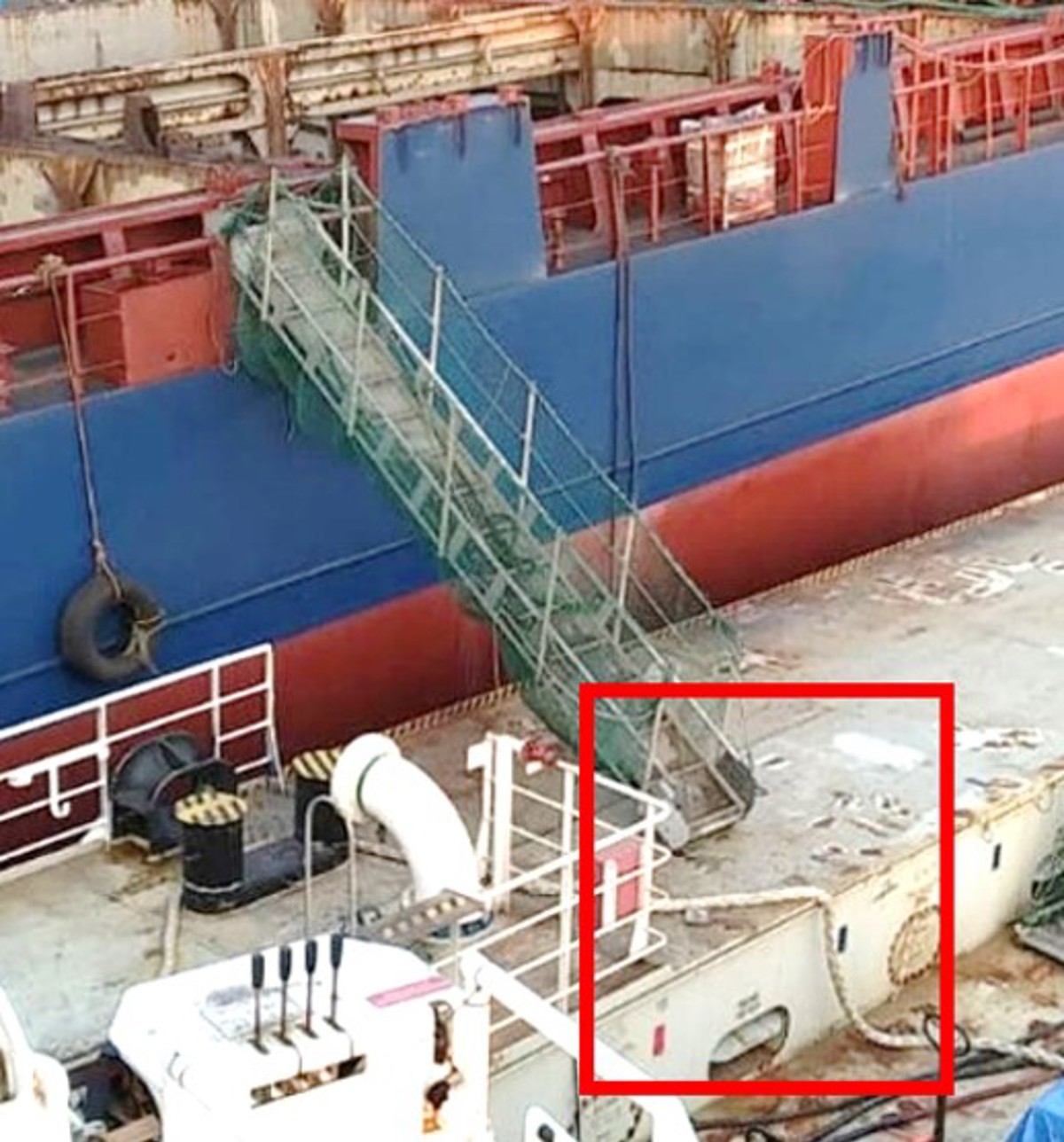 The bottom of the gangway was placed on the deck less than 1m from an un-barriered drop on the quay, which  could potentially have led personnel descending the gangway to fall