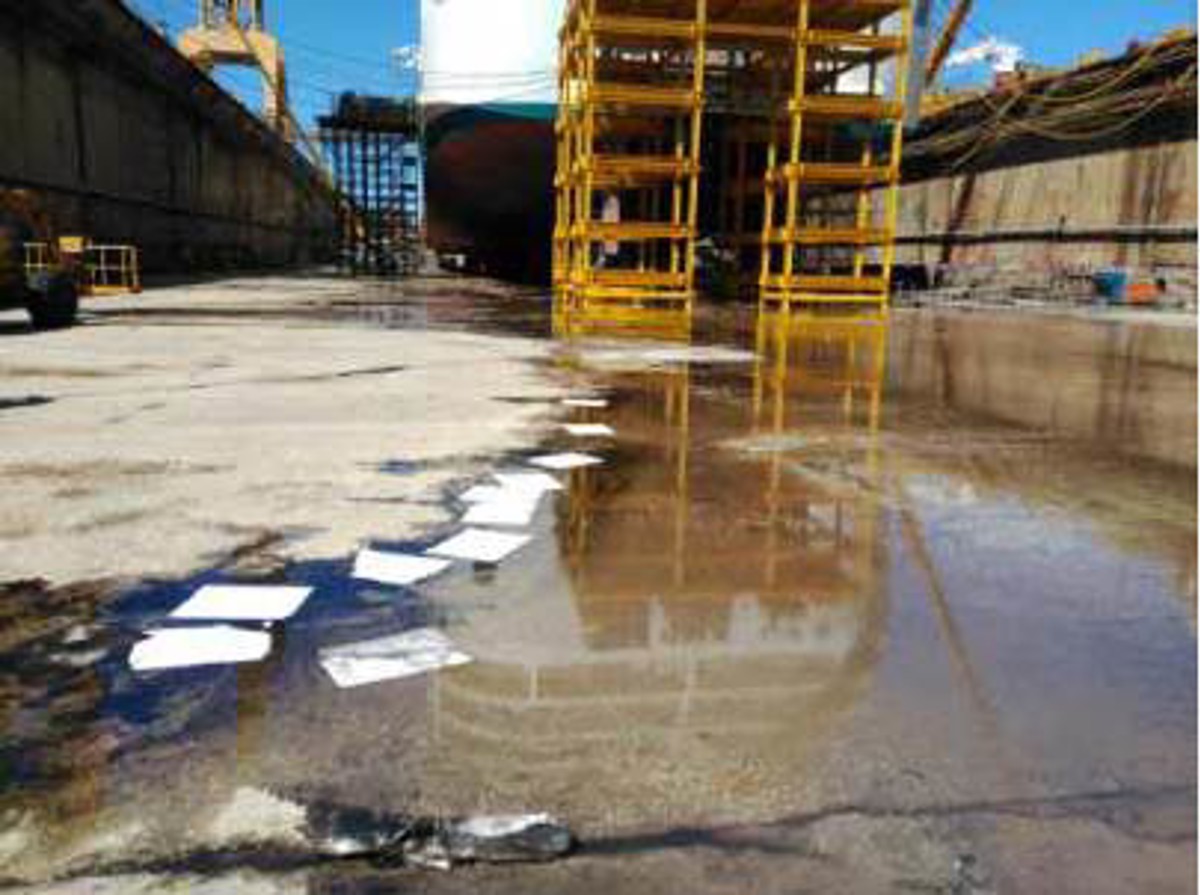 Bilge water drained into graving dock