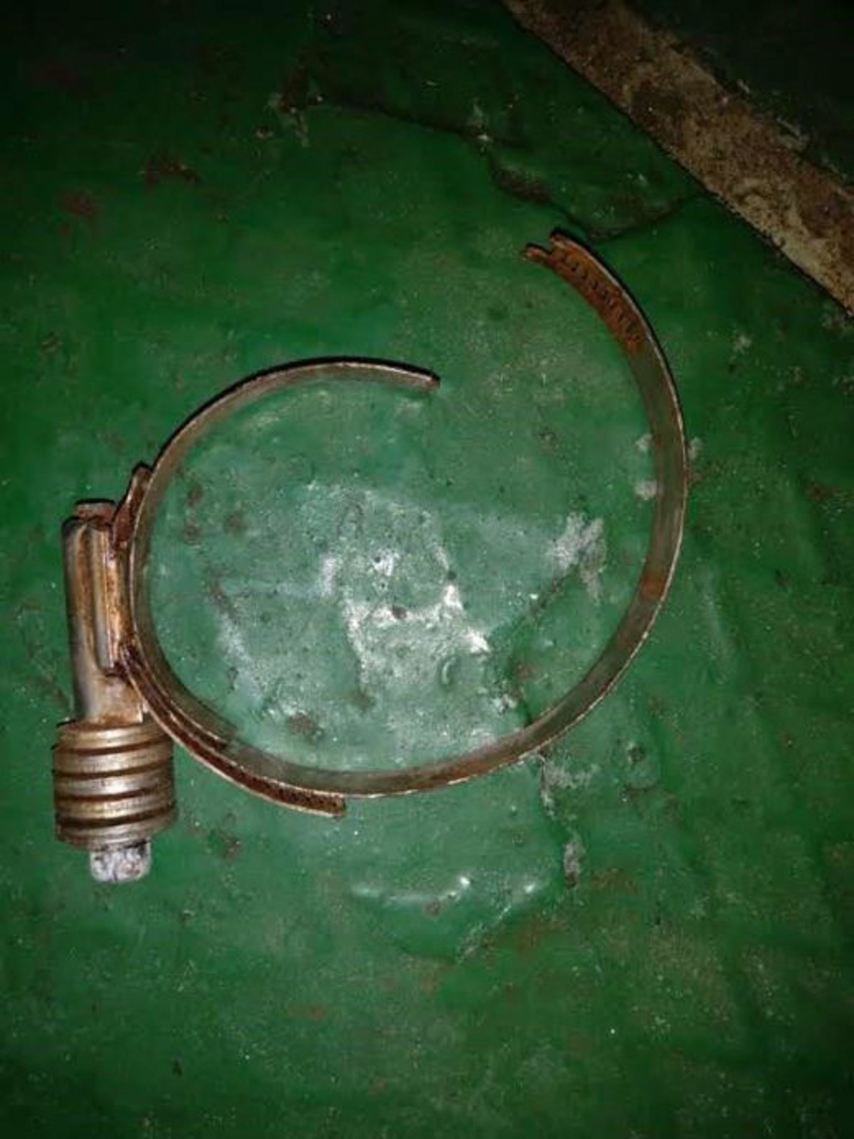 failed hose clamp, mounted on the discharge side