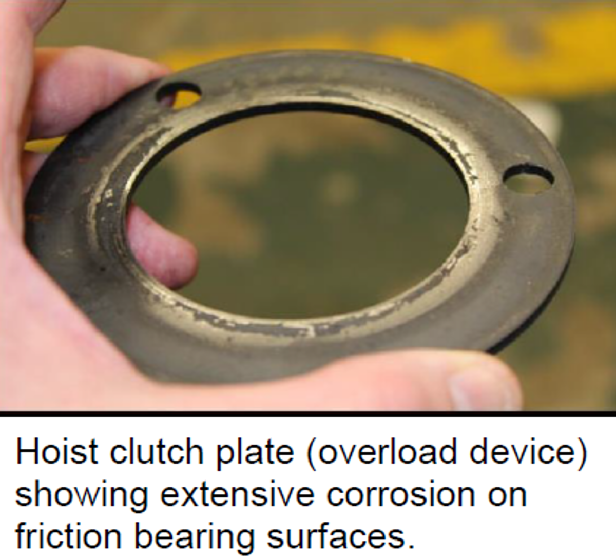 hoist clutch plate (overload device) showing extensive corrosion on friction bearing surfaces