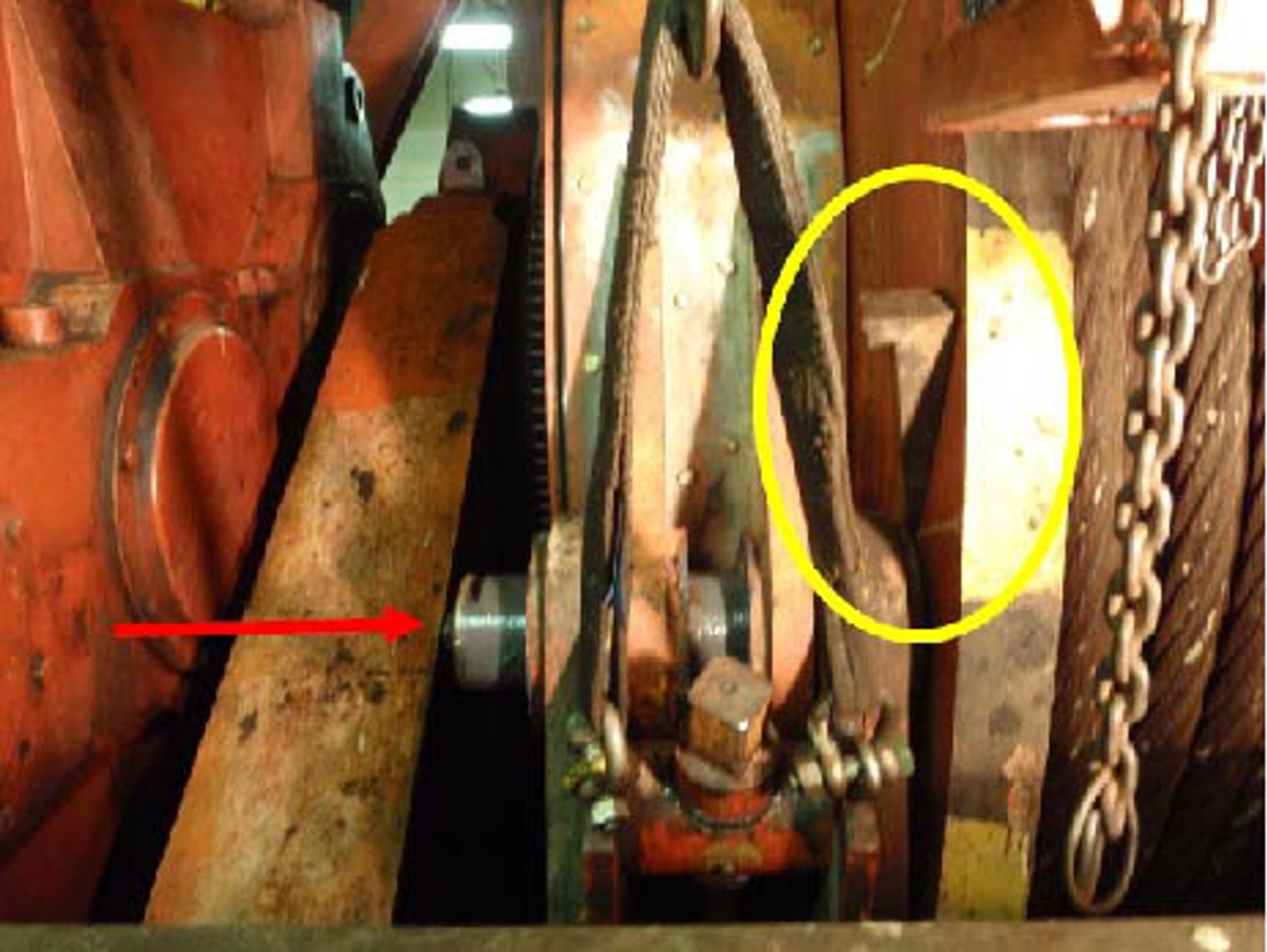 IMCA SF Right hand hit by flying wedge 2 The wedge which came loose (yellow circle)