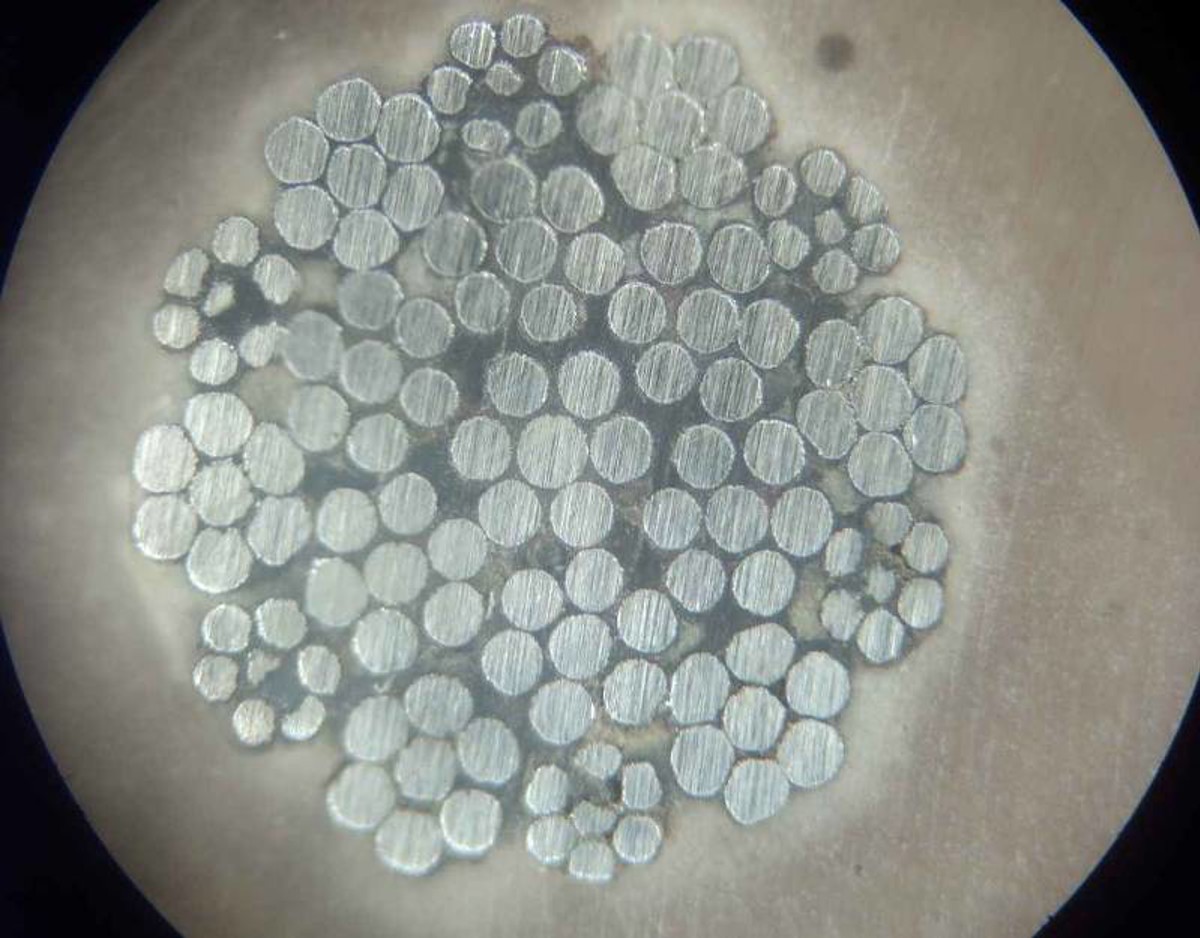 IMCA SF Partial parting of a bell main lift wire 2 Photograph of a section taken from the core of the rope close to the fracture