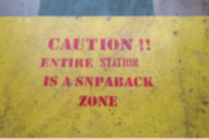 Snapback zone warning sign