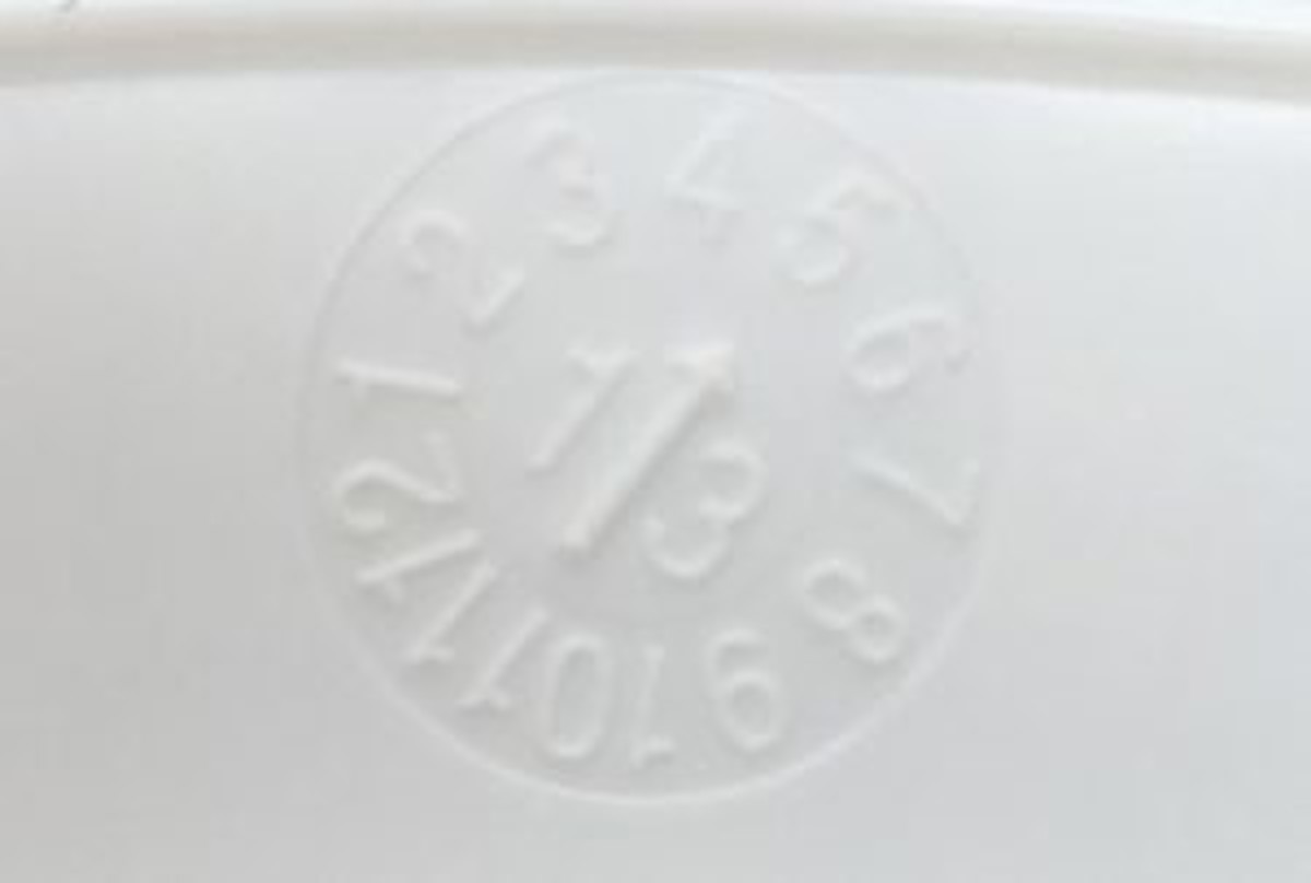 Helmets will have some form of embossed date stamp similar to that in the illustrations below